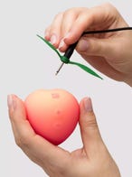 Romp Pink Peach Pleasure Air Clitoral Stimulator